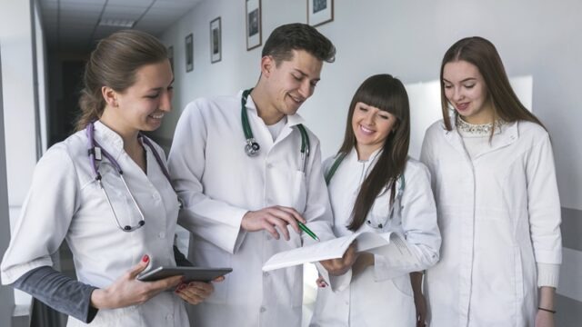 male-female-medics-with-papers